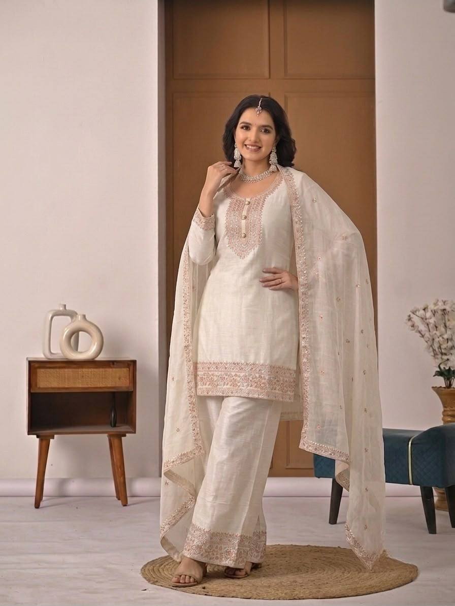 Pristine Ivory White Kurta and Palazzo Set Featuring Delicate Floral Embroidery, Sequined Borders, and a Matching Sheer Dupatta